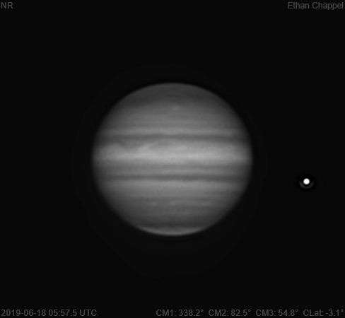 There is a bright spot on the central meridian at mid-northern latitudes. As far as I can tell, this spot is almost indistinguishable in visible light.